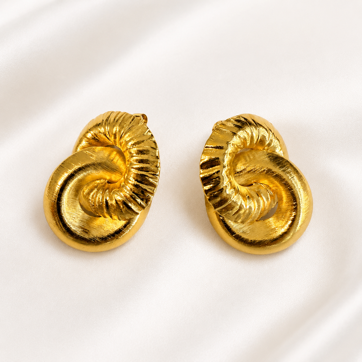 Aretes Nautilus Dorado